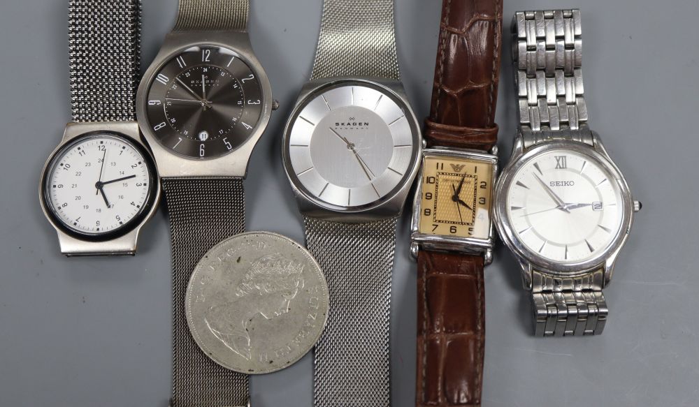 Five assorted gentlemans wrist watches including Skagen and Seiko and a coin.